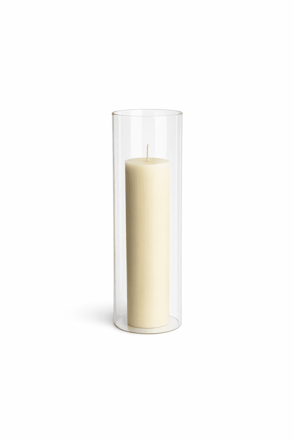 The Pillar Candle Holder | Glass Cylinder showcases a cream pillar candle in a tall, clear glass holder—ideal for elegant event or wedding hire on the Sunshine Coast and Brisbane.