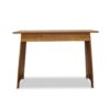 This elegant wooden table, perfect for event hire, features a rectangular top and angled legs, viewed from the front.