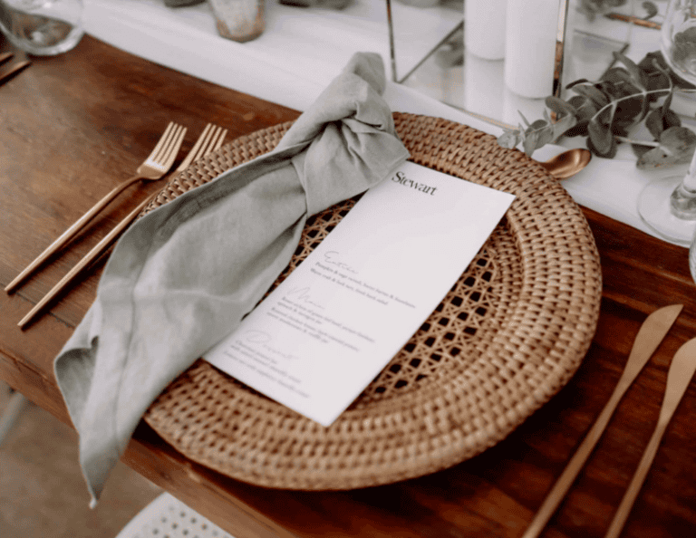 A Plate l Rattan Charger elegantly set for your Gold Coast wedding hire experience.