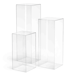 Three Pedestal l Clear display boxes of different heights are arranged on a white background, each serving as a transparent pedestal to elegantly showcase your items.