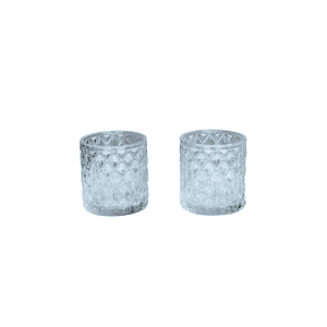 The Emme Tea Light Holder features two clear, textured glass tumblers with a diamond pattern, displayed side by side on a white background—an elegant choice for stylish tea light displays.