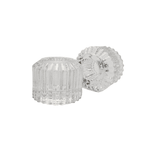Two clear Ava 2 In 1 Candle Holders are displayed on a white background—one upright, one on its side—to highlight their versatile ribbed glass design.