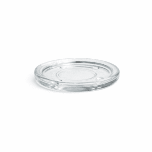 The Candle Coaster l Glass, a clear round glass coaster, is displayed on a white background.