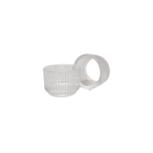 Two clear, ribbed glass Tea Light Holder l Willow are displayed—one upright, one on its side—adding an elegant touch to any Willow inspired décor.