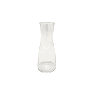 The Floral Vase l Curvy Clear Bud is a clear glass vase with a narrow neck and wide base, resembling a curvy bud vase, displayed upright on a plain white background.