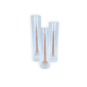 Three tall, clear Candle Sleeves each hold a single tapered pink candle, elegantly arranged together on a white background.